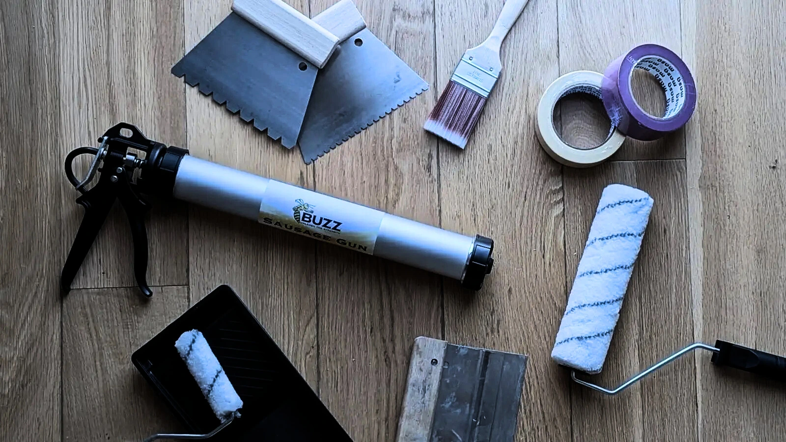 wood floor finish applicators, paintbrush, roller, glue trowel, filling trowel, sausage gun, masking tape, floor finishes